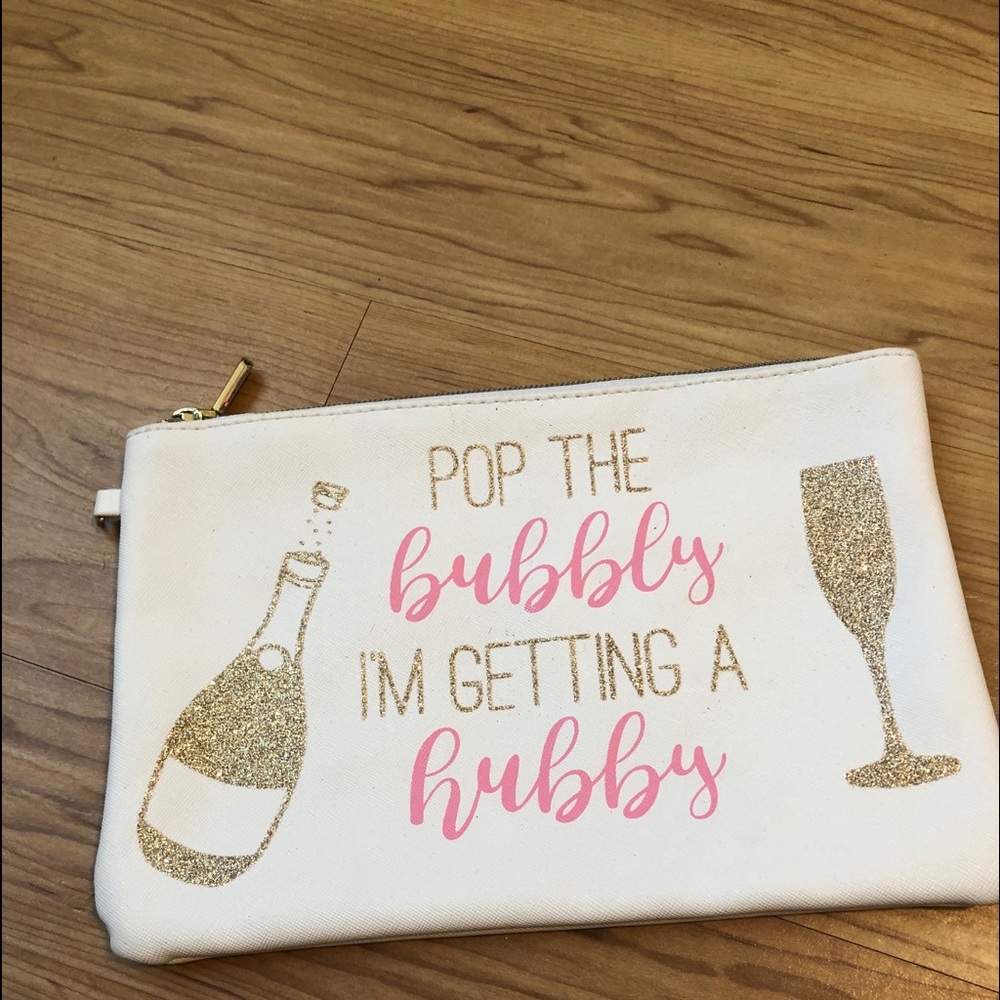 Makeup bag pop the bubbly I’m getting a hubby